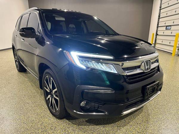 Honda Pilot with VIN: 5FNYF6H08KB040422