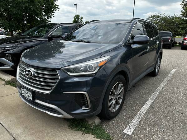Hyundai Santa Fe with VIN: KM8SMDHF0HU222437
