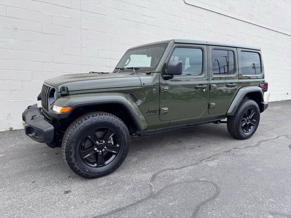 Jeep Wrangler with VIN: 1C4HJXEN9PW698208