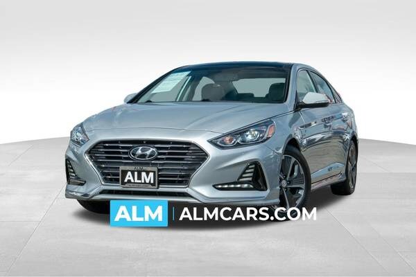 Hyundai Sonata Hybrid with VIN: KMHE34L34JA079206