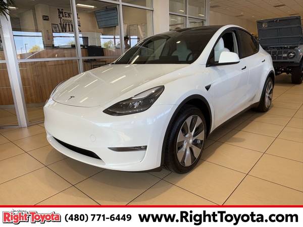 Tesla Model Y with VIN: 7SAYGDEE0PF740169