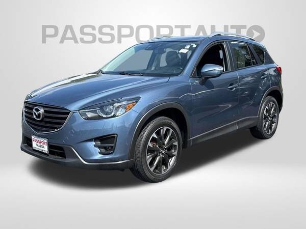 Mazda CX-5 with VIN: JM3KE4DY1G0690277