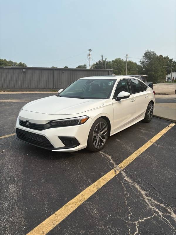 Honda Civic with VIN: 2HGFE1F96RH320621
