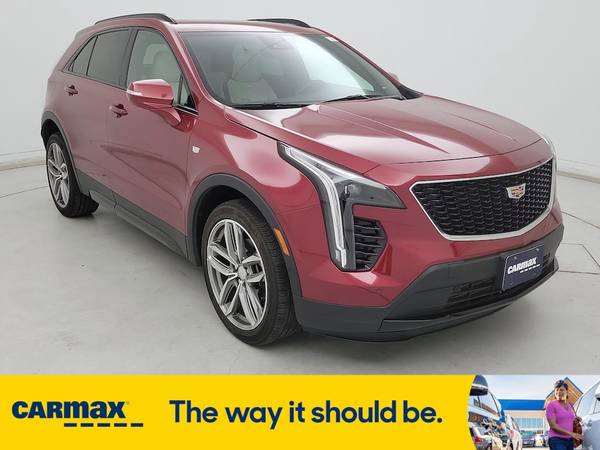 Cadillac XT4 with VIN: 1GYFZER42KF197038