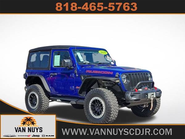 Jeep Wrangler with VIN: 1C4HJXCG6JW258331
