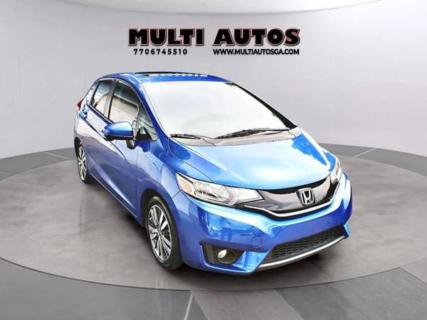 Honda Fit with VIN: JHMGK5H77GX004019
