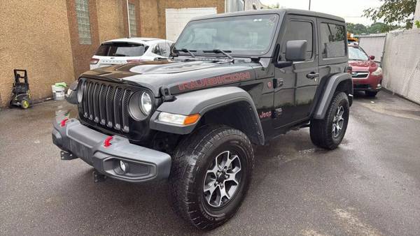 Jeep Wrangler with VIN: 1C4HJXCG8MW665362