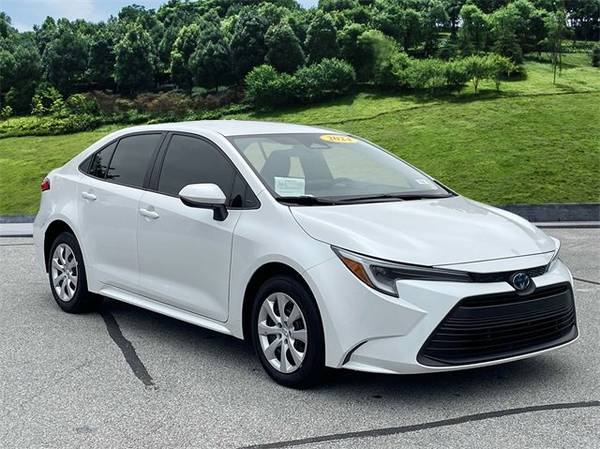 Toyota Corolla Hybrid with VIN: JTDBCMFE8R3050635
