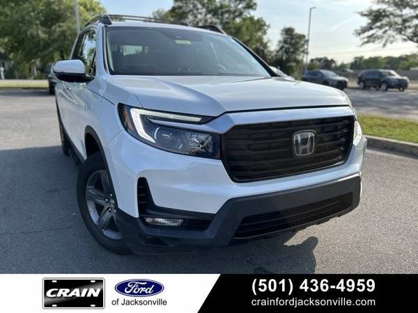 Honda Ridgeline with VIN: 5FPYK3F76NB005870