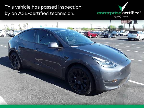 Tesla Model Y with VIN: 5YJYGAEE0MF207214