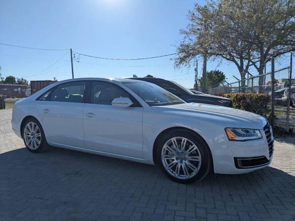 Audi A8 with VIN: WAU3GAFD0FN020010