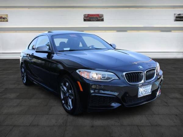 BMW 2 Series with VIN: WBA1J7C52FV358193