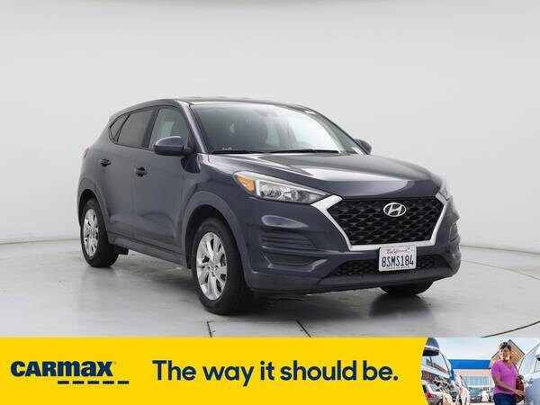 Hyundai Tucson with VIN: KM8J2CA44KU894853