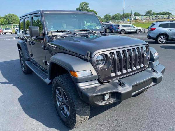 Jeep Wrangler with VIN: 1C4HJXDNXJW324683