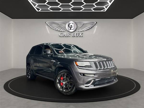 Jeep Grand Cherokee with VIN: 1C4RJFDJXEC536096