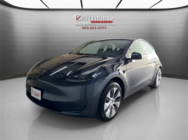 Tesla Model Y with VIN: 7SAYGDED6RF030493