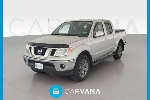 Used Silver 2015 Nissan Frontier 5 seat SL 4dr Crew Cab 4WD 5.0 ft. SB (Brilliant Silver)